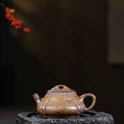 Ấm tử sa thạch điều hư biến đoạn nê nung củi( điêu khắc thủ công)